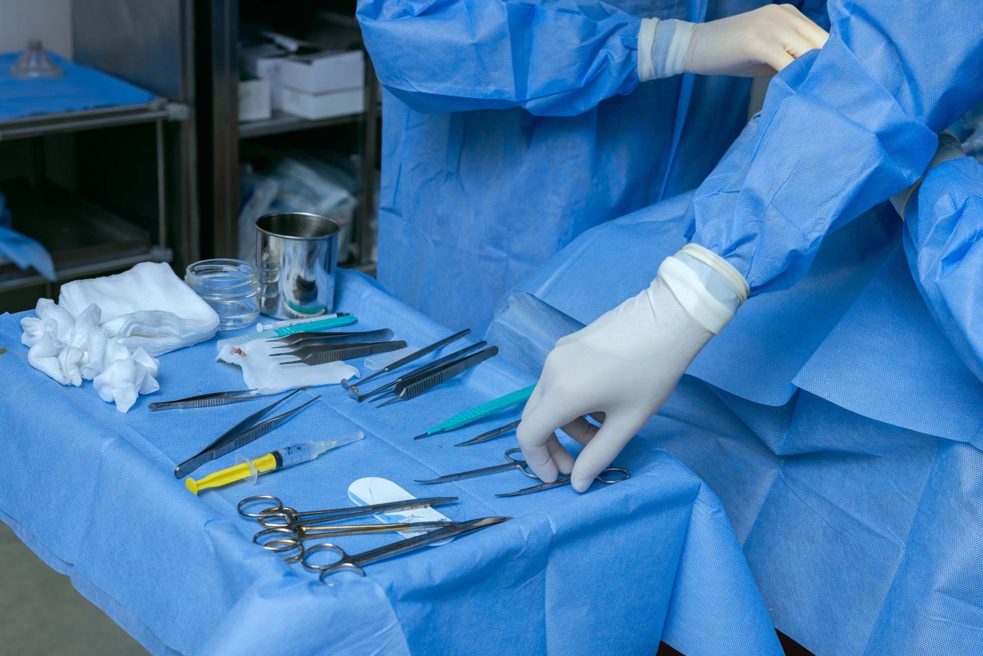 male surgeons perform surgery in operating room, plastic surgeon in operating room